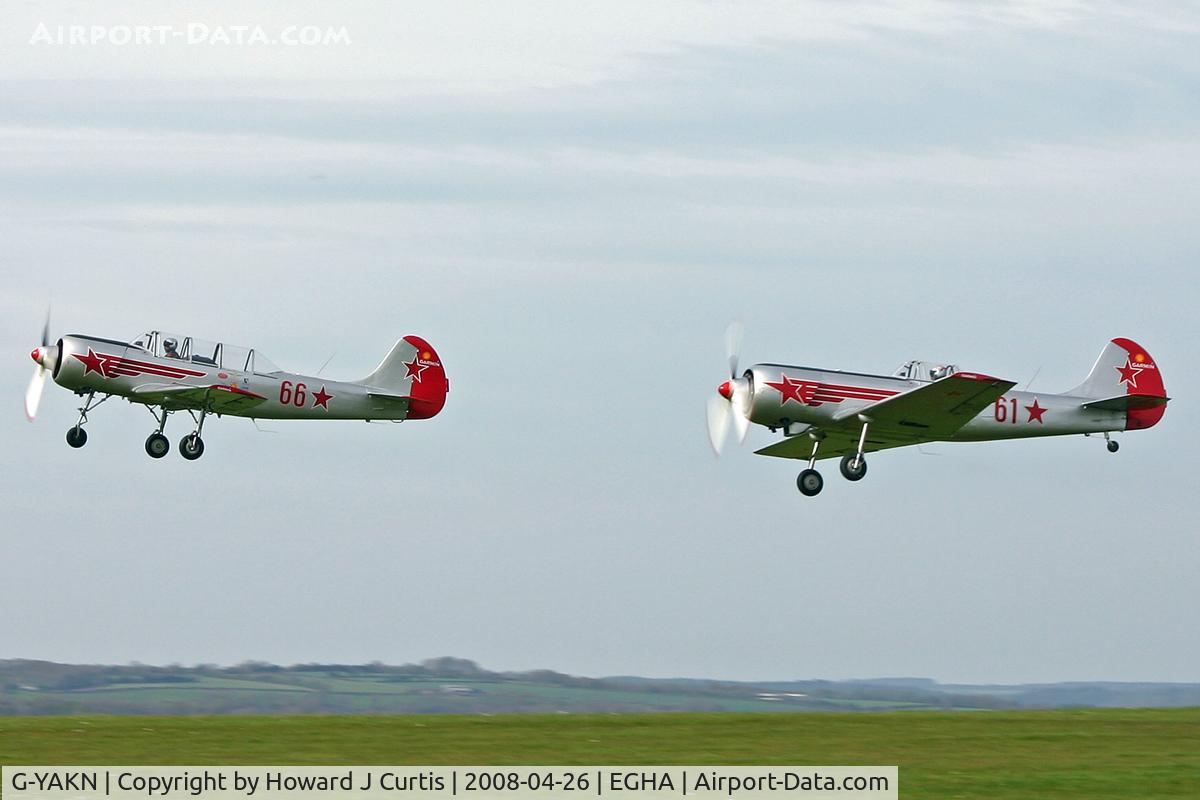 G-YAKN, 1985 Bacau Yak-52 C/N 855905, 66 red, leading Yak-52 G-YAKM (61 red).