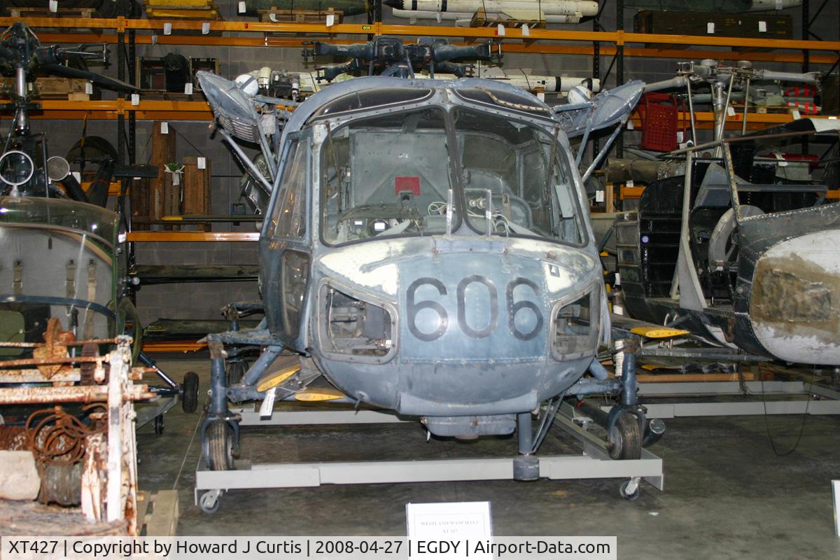 XT427, 1965 Westland Wasp HAS.1 C/N F9597, Royal Navy, coded 606. In the FAA Museum's Cobham Hall storage and restoration facility.