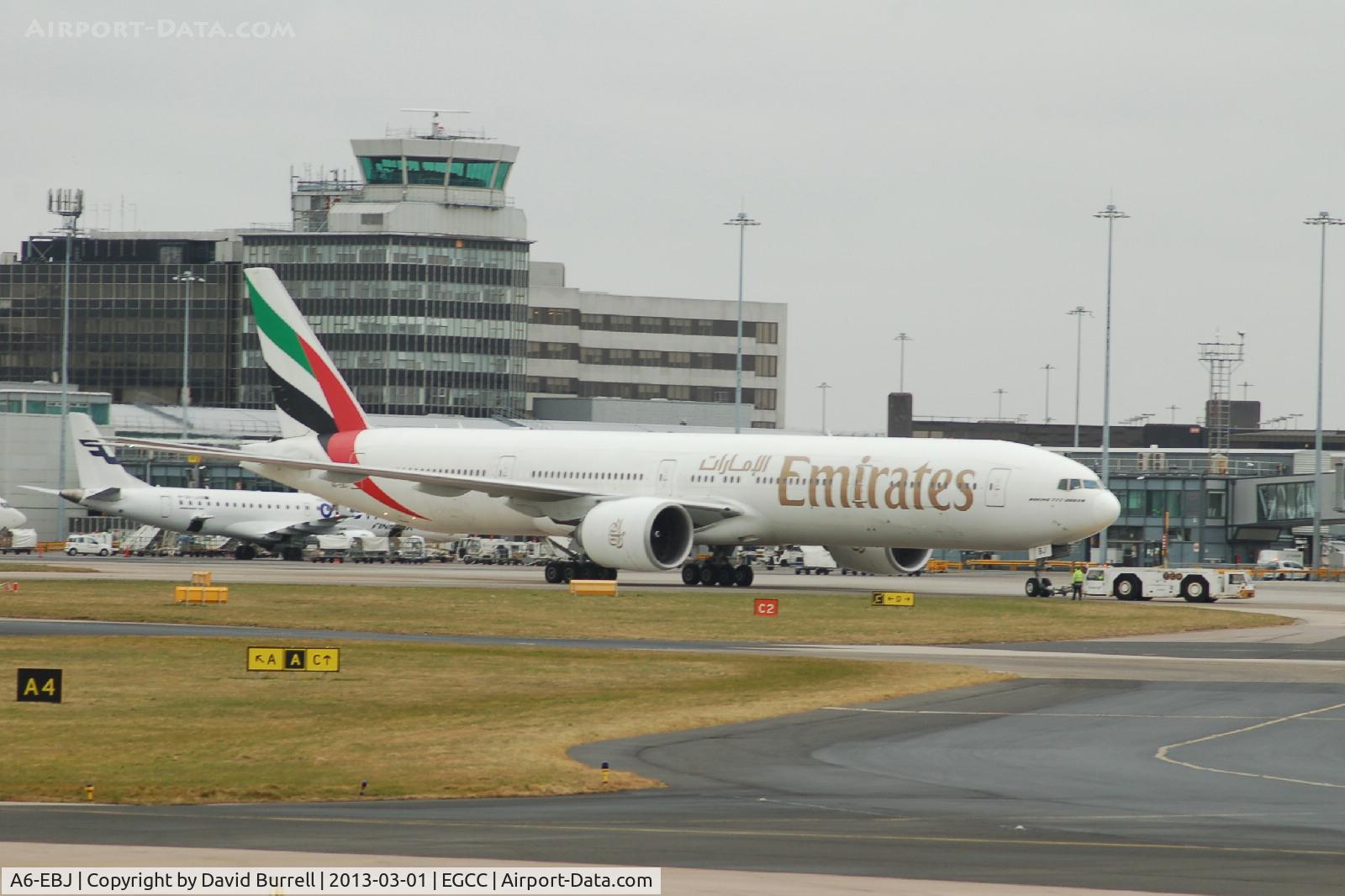 A6-EBJ, 2005 Boeing 777-36N/ER C/N 32787, Emirates Boeing 777 being prepared for take off at Manchester Airport