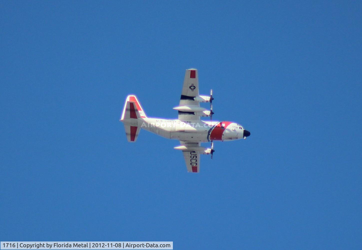 1716, 1985 Lockheed HC-130H Hercules C/N 382-5023, Coast Guard HC-130H flying over Tampa Airport