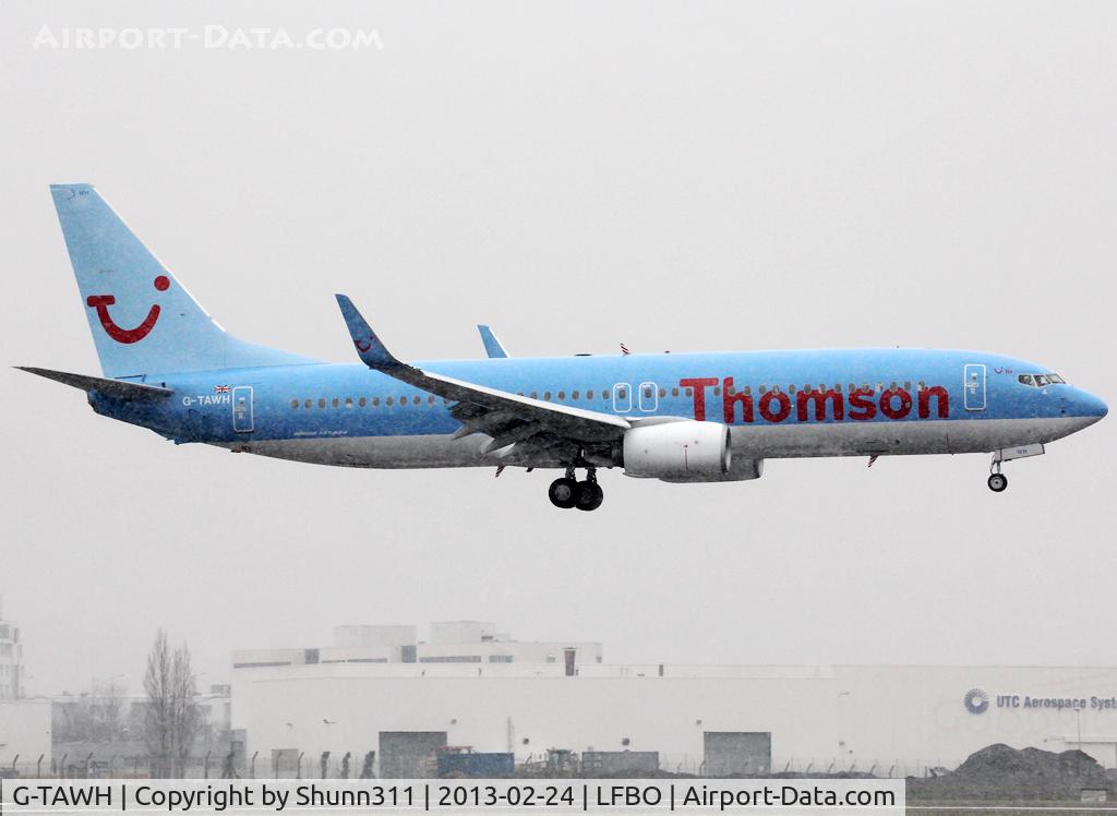 G-TAWH, 2012 Boeing 737-8K5 C/N 38107, Landing rwy 32R under snow conditions...