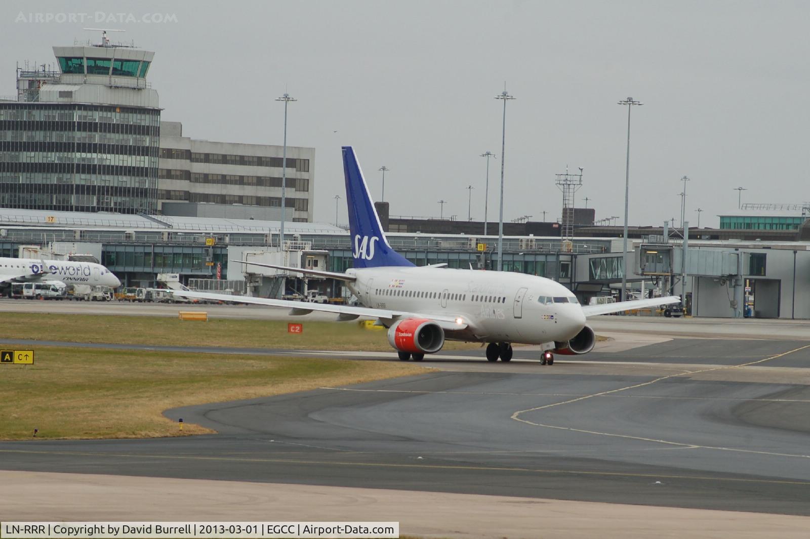LN-RRR, 1999 Boeing 737-683 C/N 28309, SAS Boeing 737-683 taxiing at Manchester Airport