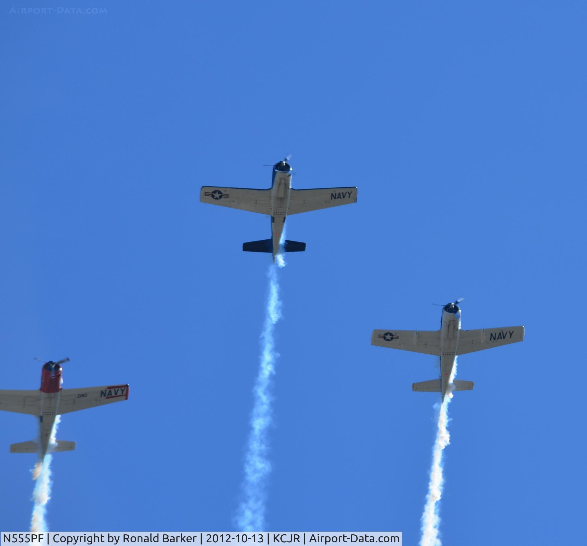 N555PF, 1954 North American T-28B Trojan C/N 200-336 (138265), T-28 formation - N555pf leading N65491 on the left and N194RR on the right - Culpeper Air Fest 2012