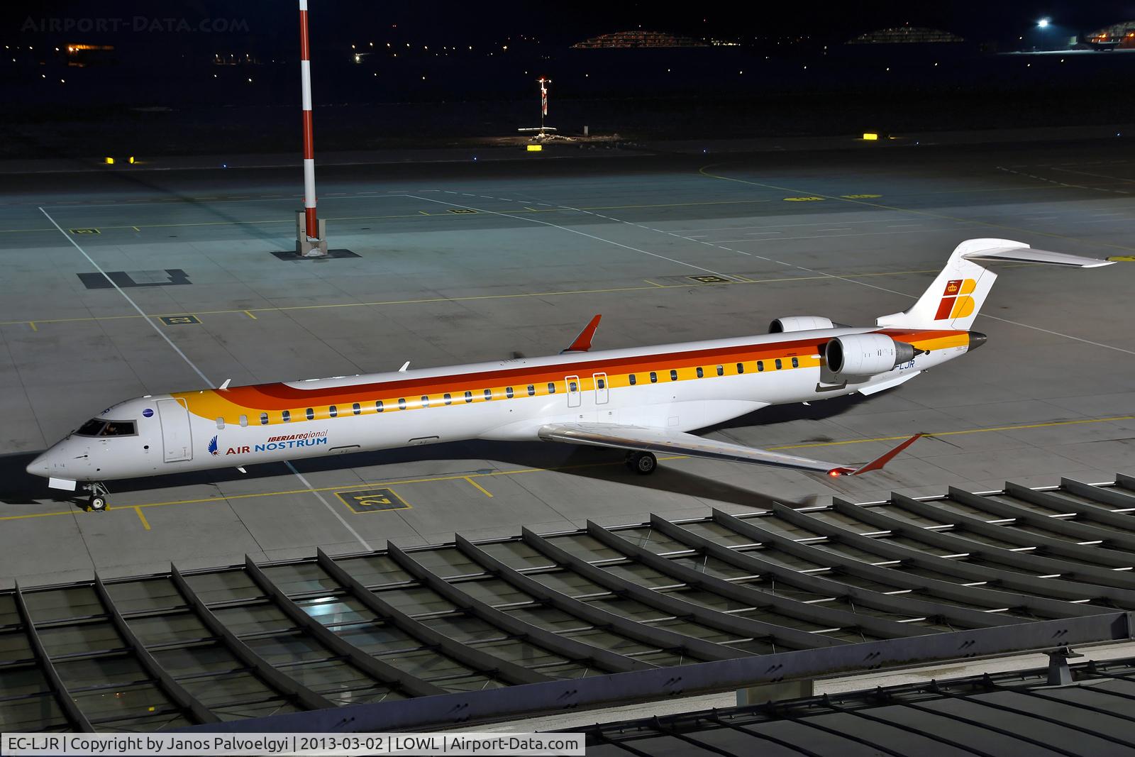 EC-LJR, 2010 Bombardier CRJ-1000ER NG (CL-600-2E25) C/N 19002, Air Nostrum (Iberia Regional) Bombardier CL-600-2E25 Regional Jet CRJ-1000 on apron in LOWL/LNZ