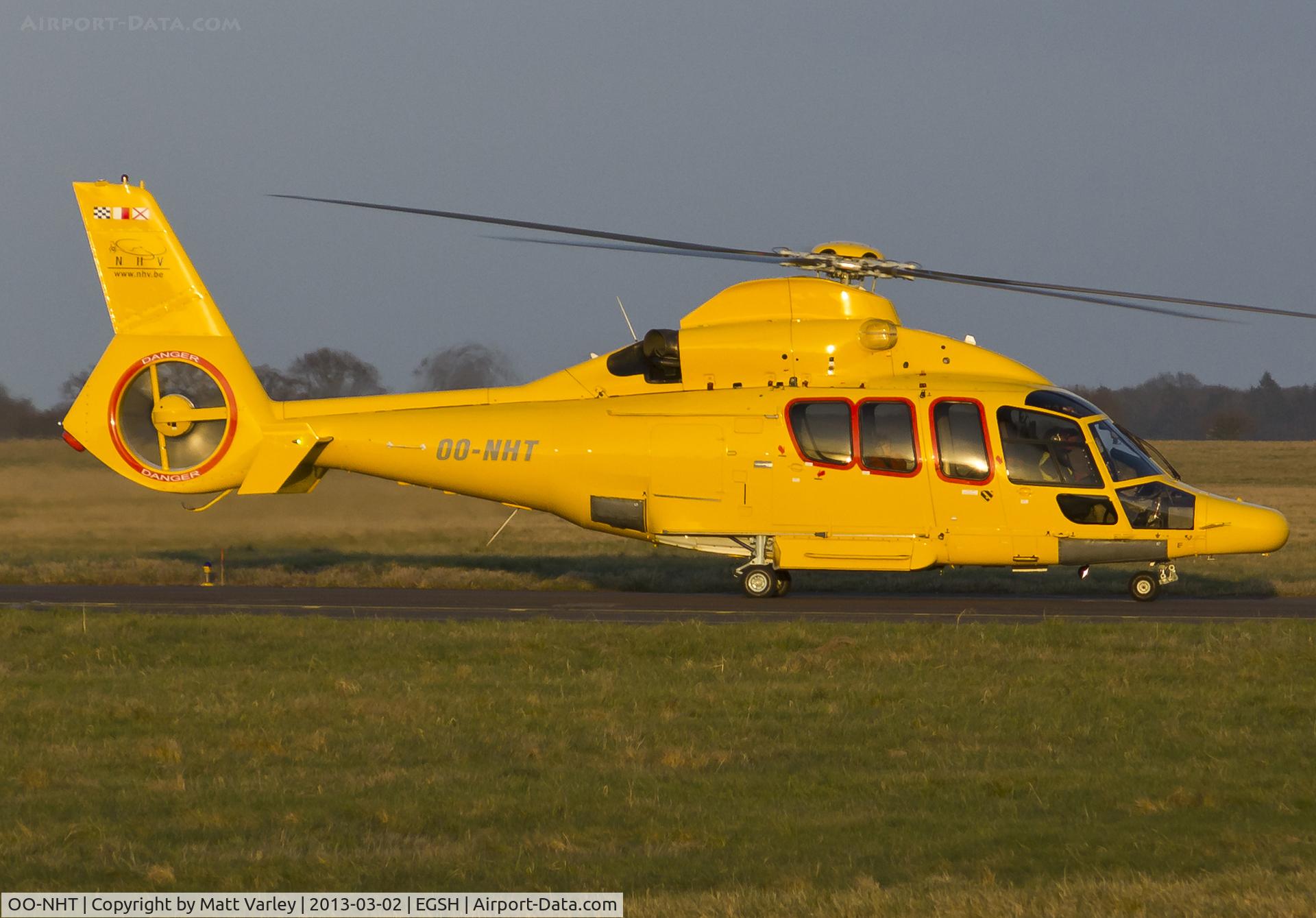 OO-NHT, 2006 Eurocopter EC-155B-1 C/N 6735, Arriving at SaxonAir in the setting sun.