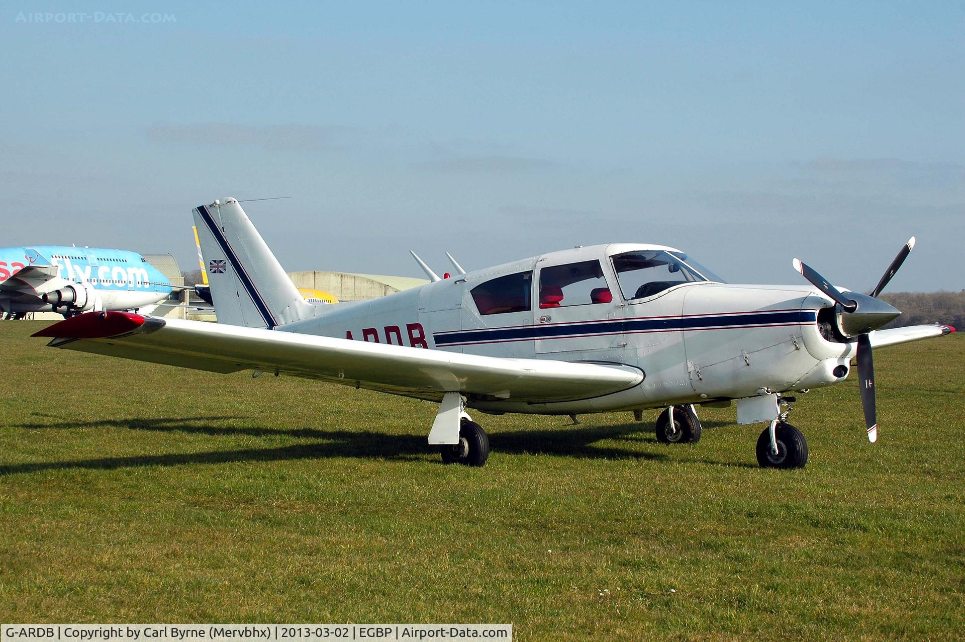 G-ARDB, 1960 Piper PA-24-250 Comanche C/N 24-2166, Sitting in the sun.