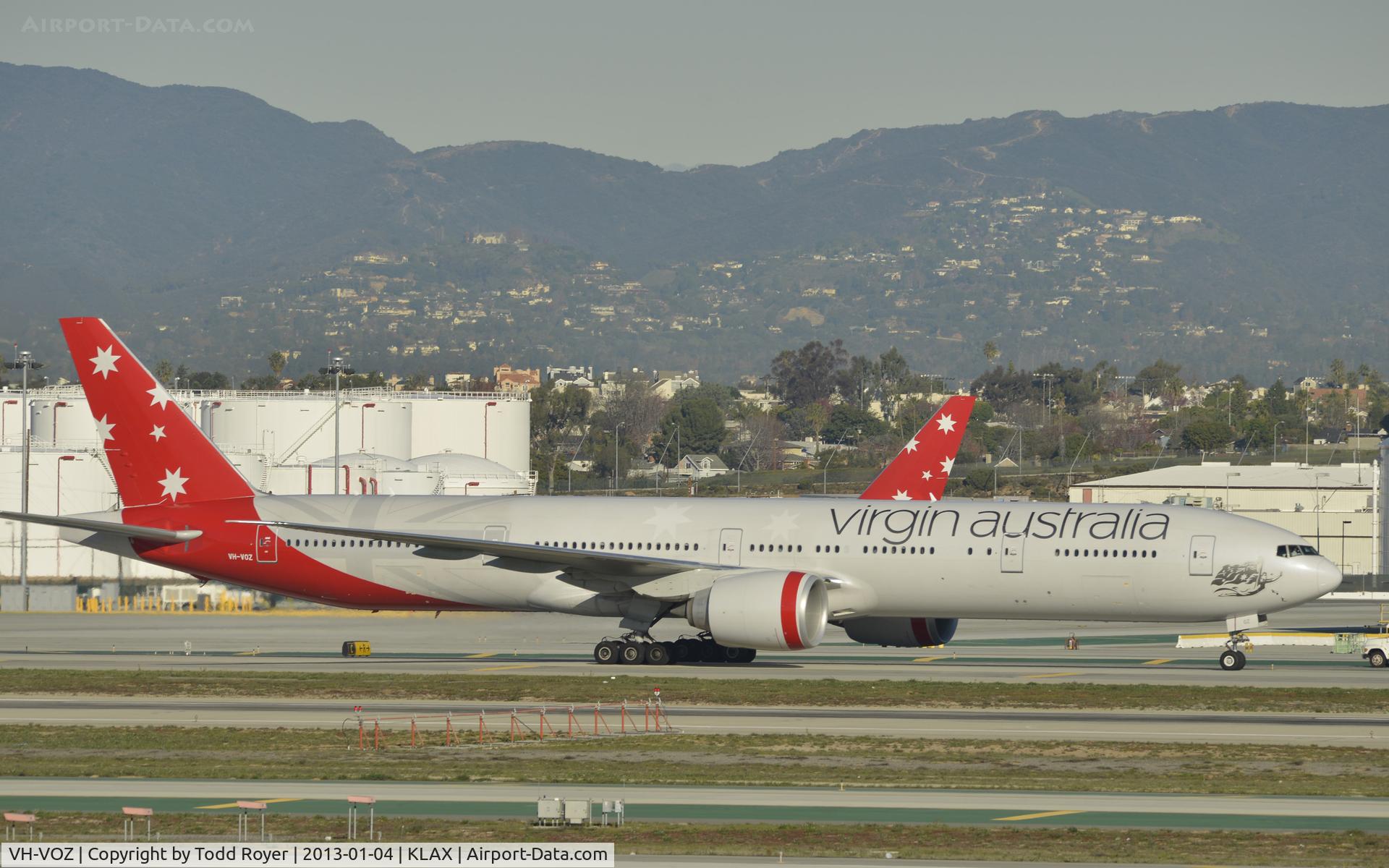 VH-VOZ, 2008 Boeing 777-3ZG/ER C/N 35302, Taxiing to gate at LAX