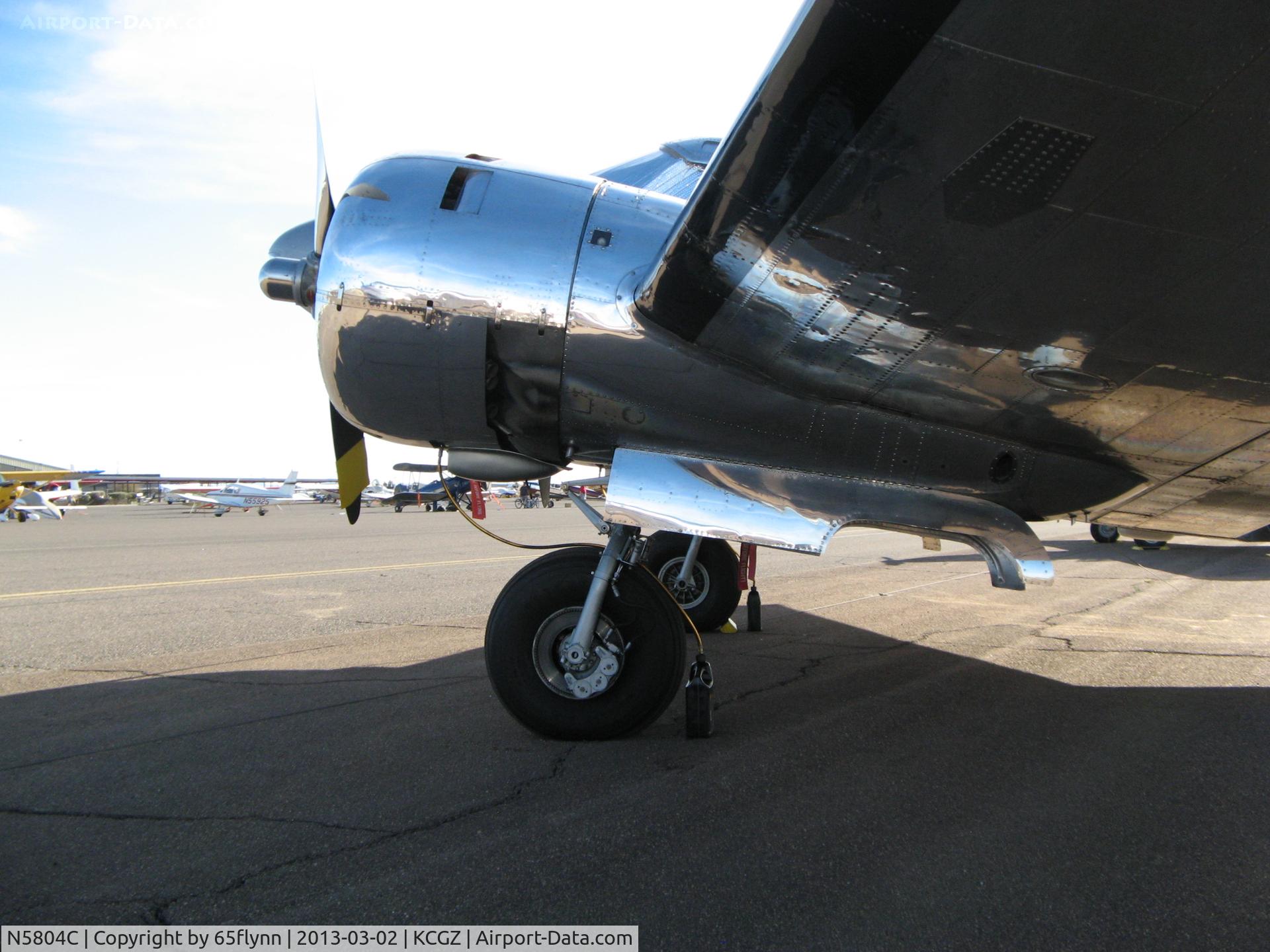 N5804C, 1951 Beech D18S C/N A579, Port side engine and cowling.  Note the responsible owners good ramp manners.