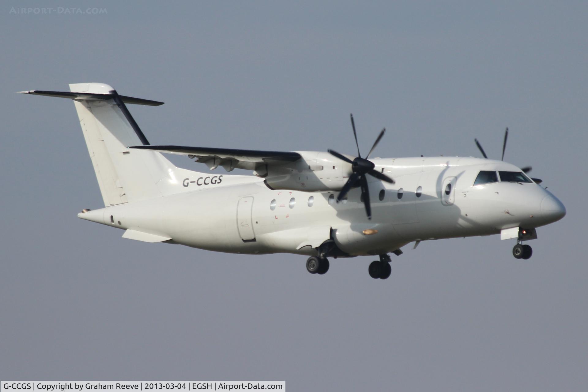 G-CCGS, 1998 Dornier 328-100 C/N 3101, About to land on 09.