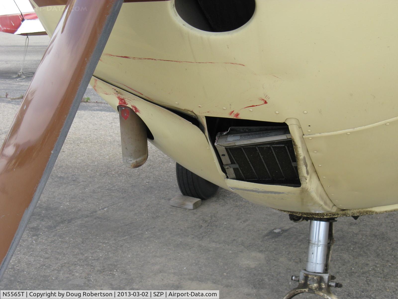 N5565T, 1964 Cessna 172E C/N 17251465, 1964 Cessna 172E, Continental O-300 145 Hp, air filter damage from being hit by N17445, a red 1931 Waco QCF biplane departure while landing Rwy 22, which see. N5556T totaled by owner's insurance company.