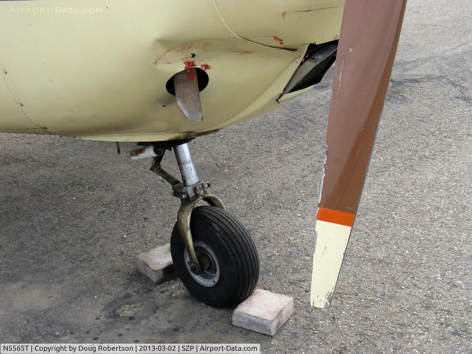 N5565T, 1964 Cessna 172E C/N 17251465, 1964 Cessna 172E, Continental O-300 145 Hp, prop & cowl damage from being hit by a red N17445 1931 Waco QCF biplane departure while landing Rwy 22, which see. N5565T totaled by owner's insurance company.