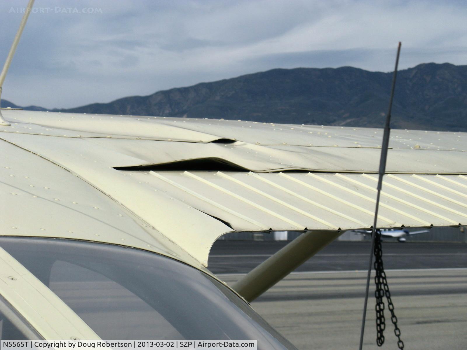 N5565T, 1964 Cessna 172E C/N 17251465, 1964 Cessna 172E, Continental O-300 145 Hp, wing & fuselage damage from a Rwy 22 landing departure of a red N17445 1931 Waco QCF biplane, which see. Cessna owner's insurance company totaled the airplane.