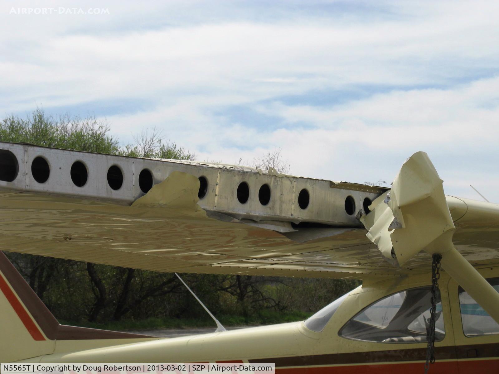 N5565T, 1964 Cessna 172E C/N 17251465, 1964 Cessna 172E SKYHAWK, wing & fuselage damage from landing departure Rwy 22 of a red N17445 1931 Waco QCF biplane striking the parked Cessna. Owner's insurance company totaled the Cessna.