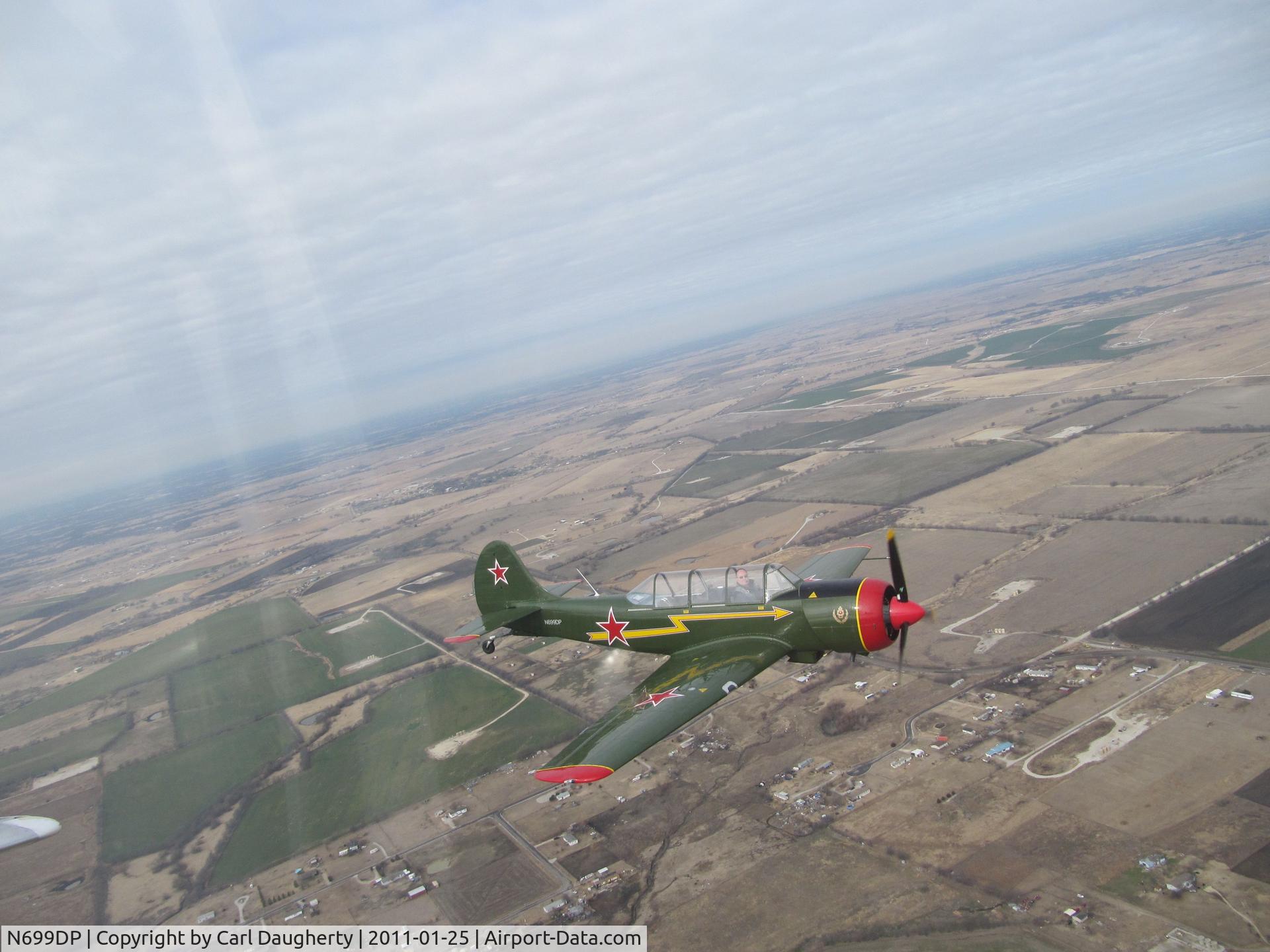 N699DP, 2002 Yakovlev (Aerostar) Yak-52TW C/N 0212302, air to air