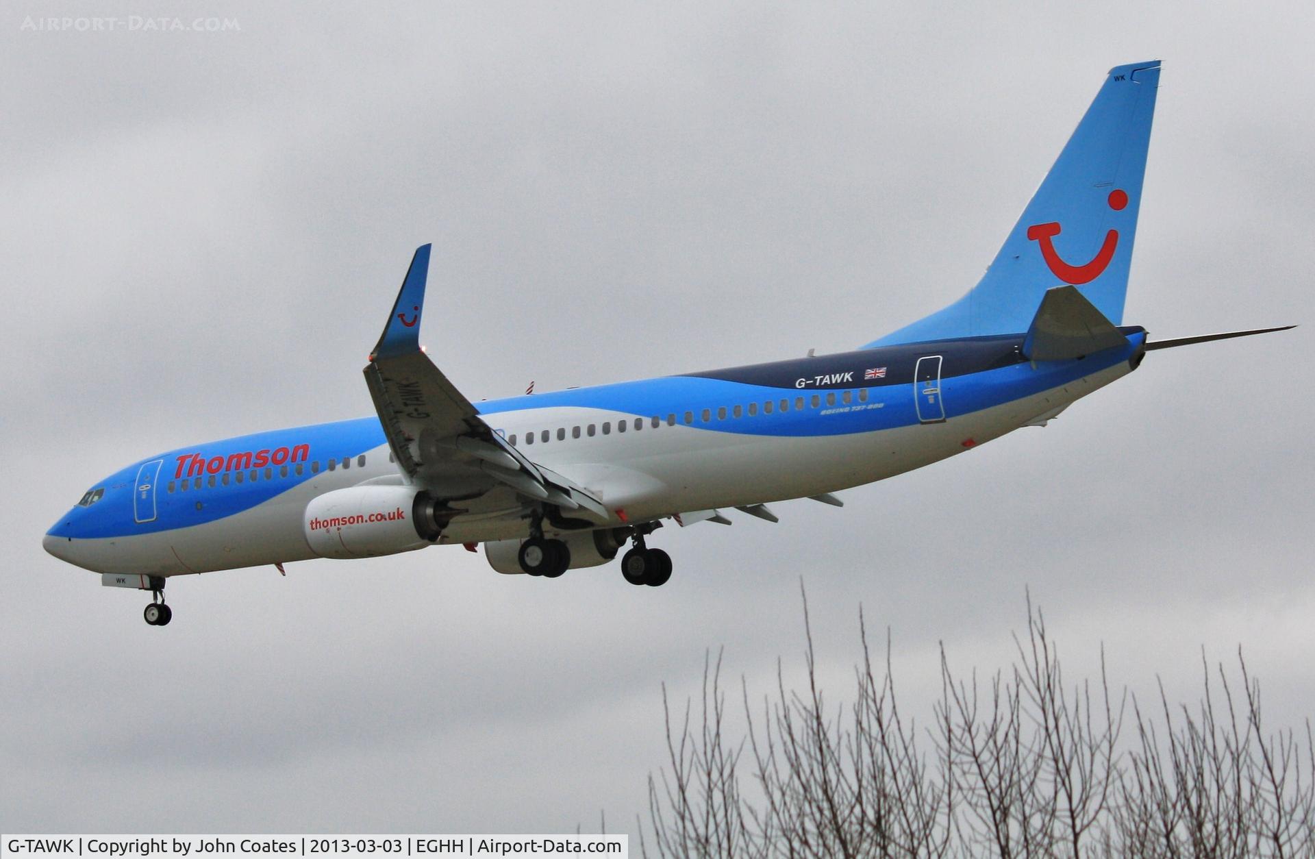 G-TAWK, 2012 Boeing 737-8K5 C/N 37239, About to land 08 on another dark, wet day.