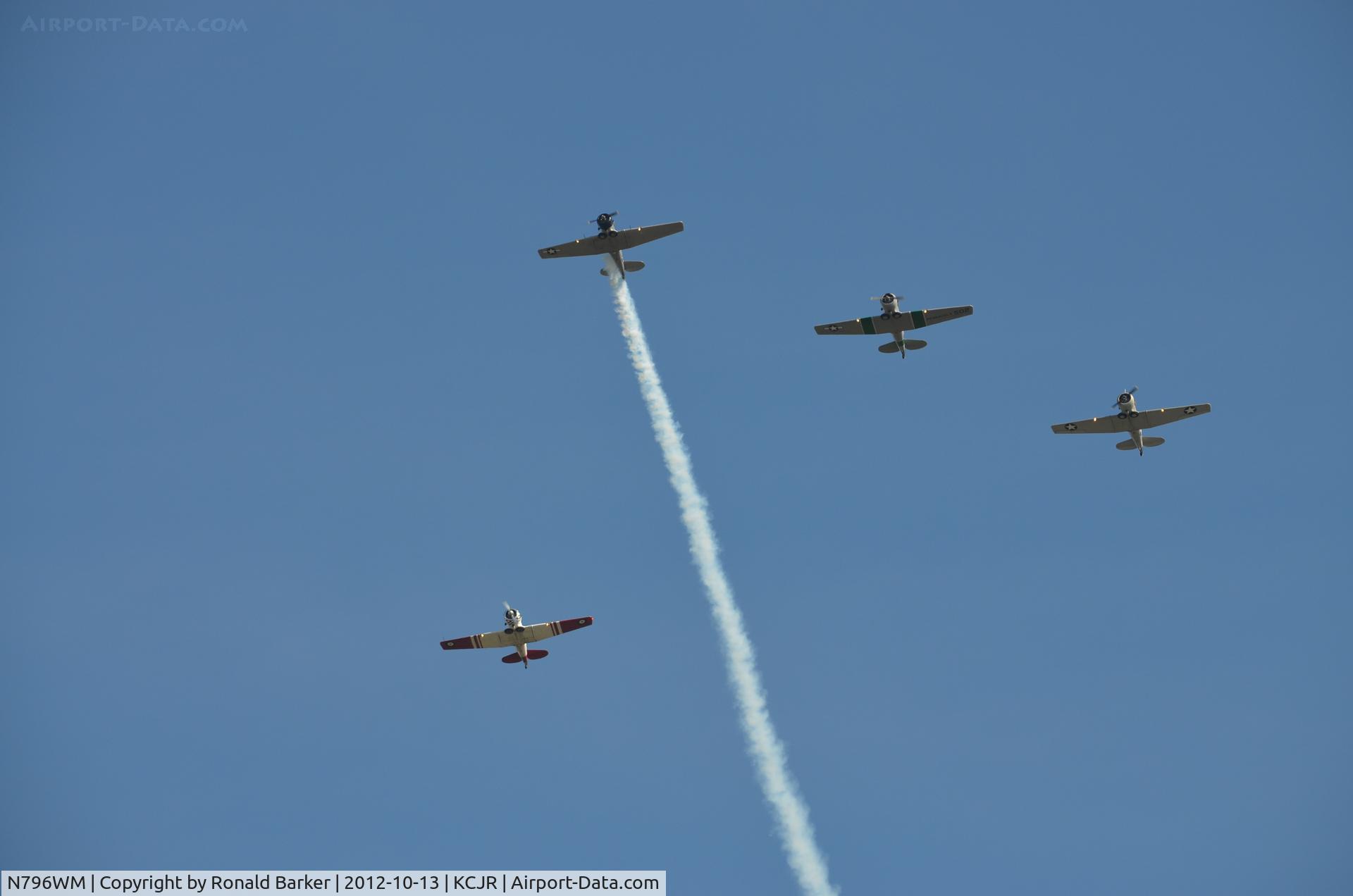 N796WM, 1943 North American AT-6D Texan C/N 88-15328, Four ship N796WM leading N7572 on left, N502 and N9801C on right - Culpeper Air Fest 2012