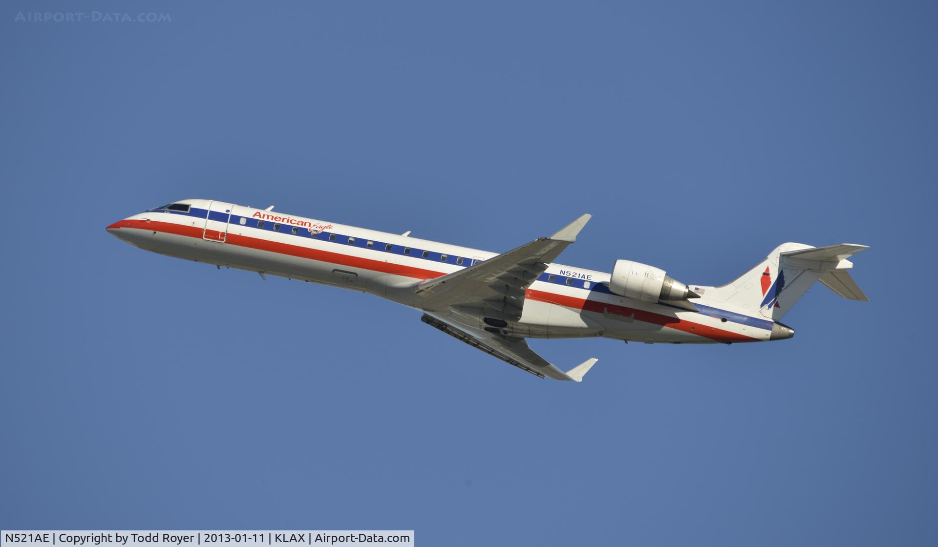 N521AE, 2004 Bombardier CRJ-701 (CL-600-2C10) Regional Jet C/N 10142, Departing LAX
