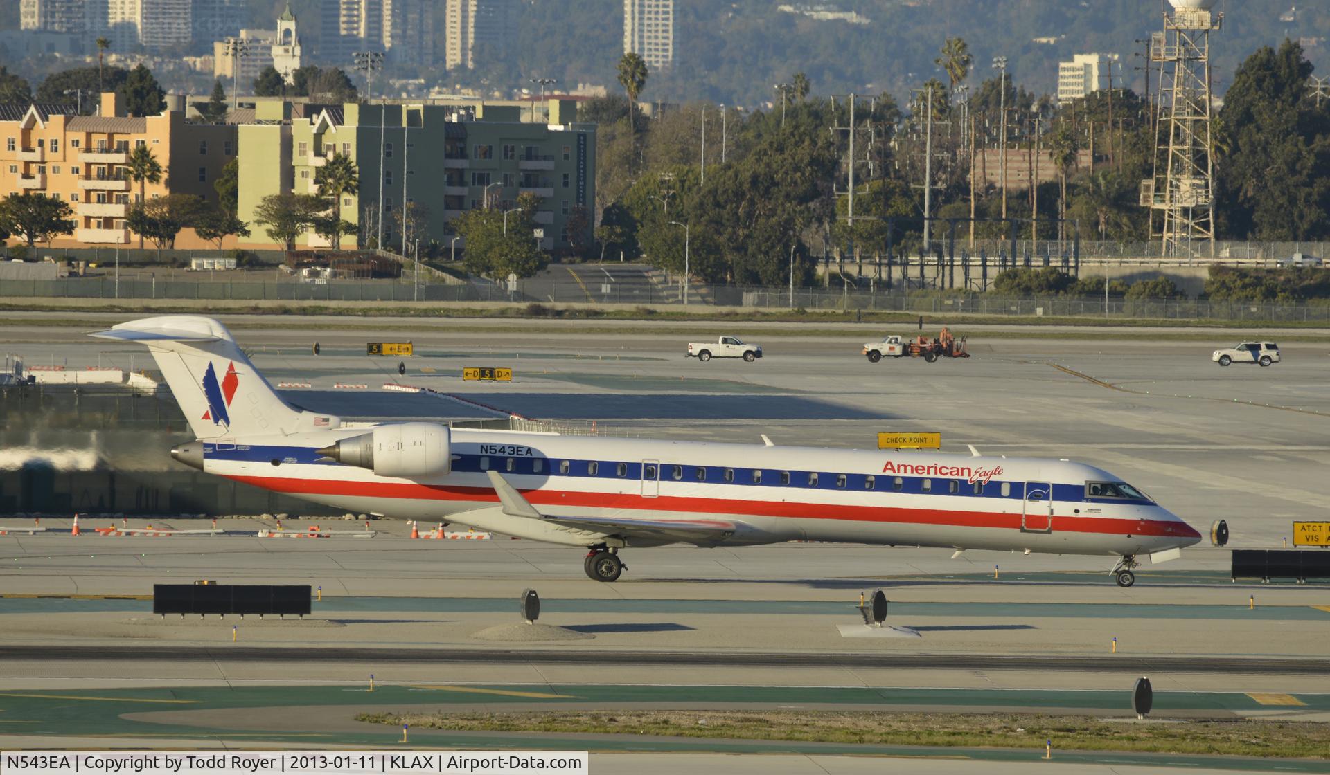 N543EA, 2011 Bombardier CRJ-700 (CL-600-2C10) Regional Jet C/N 10323, Taxiing to gate at LAX