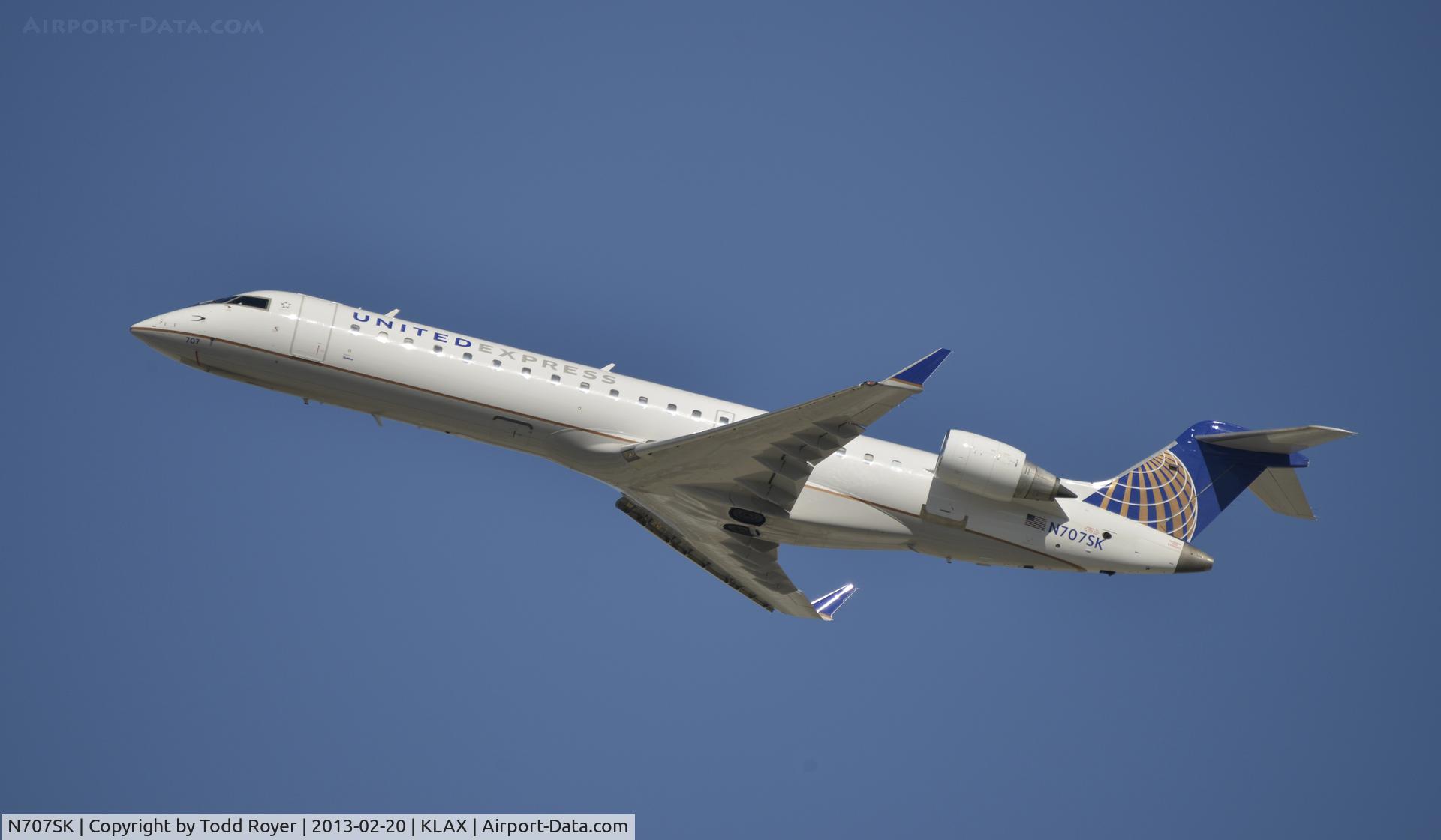 N707SK, 1999 Bombardier CRJ-701ER (CL-600-2C10) Regional Jet C/N 10003, Departing LAX