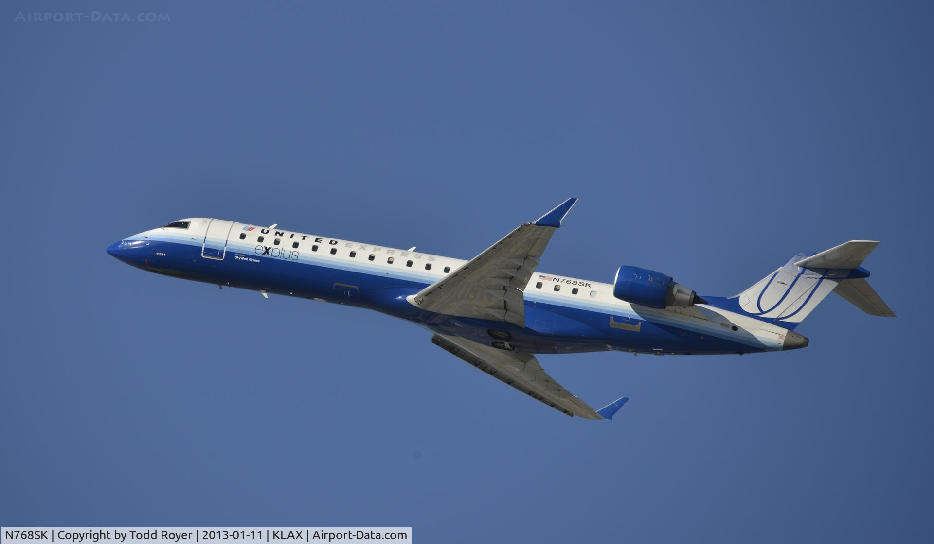 N768SK, 2005 Bombardier CRJ-701ER (CL-600-2C10) Regional Jet C/N 10234, Departing LAX