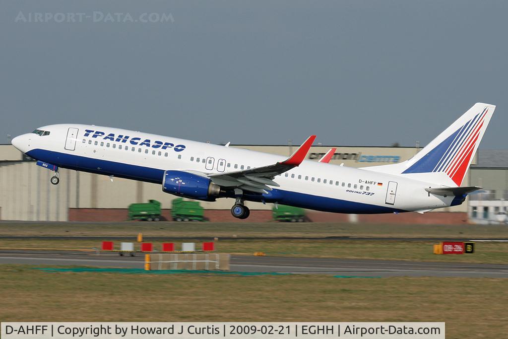 D-AHFF, 1998 Boeing 737-8K5 C/N 27980, Former Hapag-Lloyd/TUIfly 737 departs after respray in Transaero colours. The last three of its new registration, EI-EDZ, can be seen on the nosewheel door.