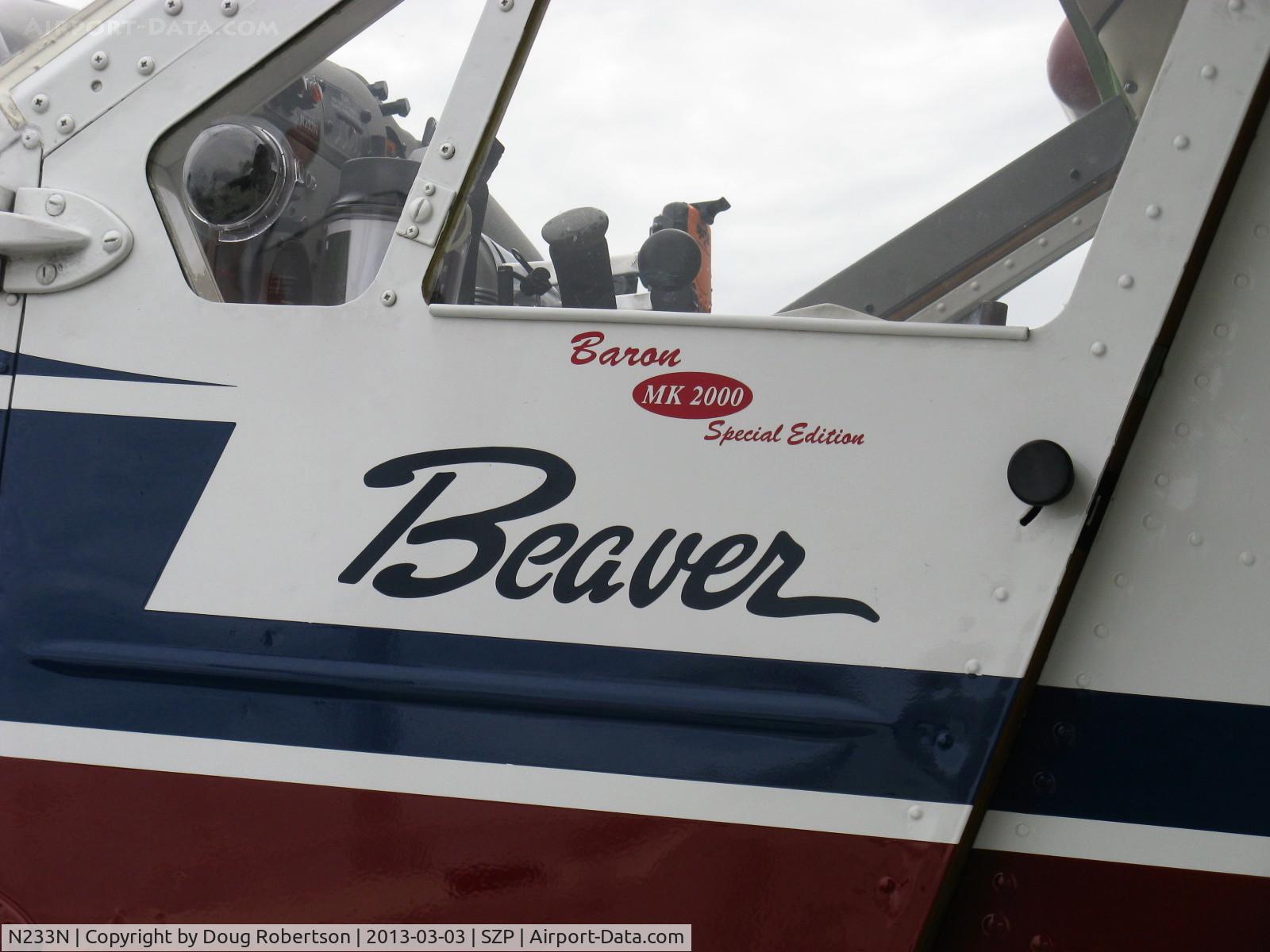 N233N, 1956 De Havilland Canada U-6A Beaver (DHC-2) C/N 976/1632, 1956 DeHavilland (Canada) DHC-2 Mk 1 BEAVER, Baron MK2000 Special Edition, P&W R-985 Wasp Jr. 450 Hp radial, logo on pilot's door