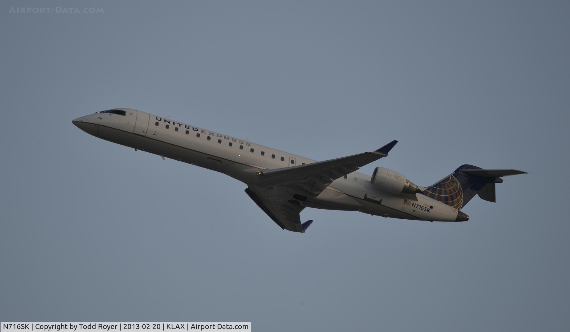 N716SK, 2004 Bombardier CRJ-701ER (CL-600-2C10) Regional Jet C/N 10180, Departing LAX