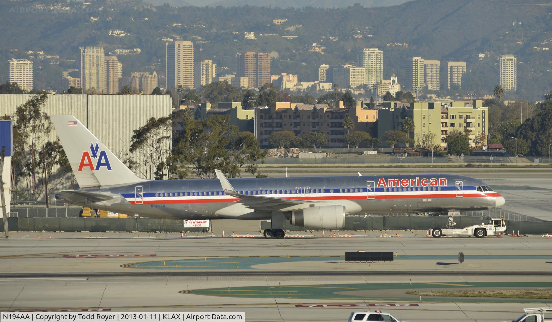 N194AA, 2001 Boeing 757-223 C/N 32388, Getting towed to gates