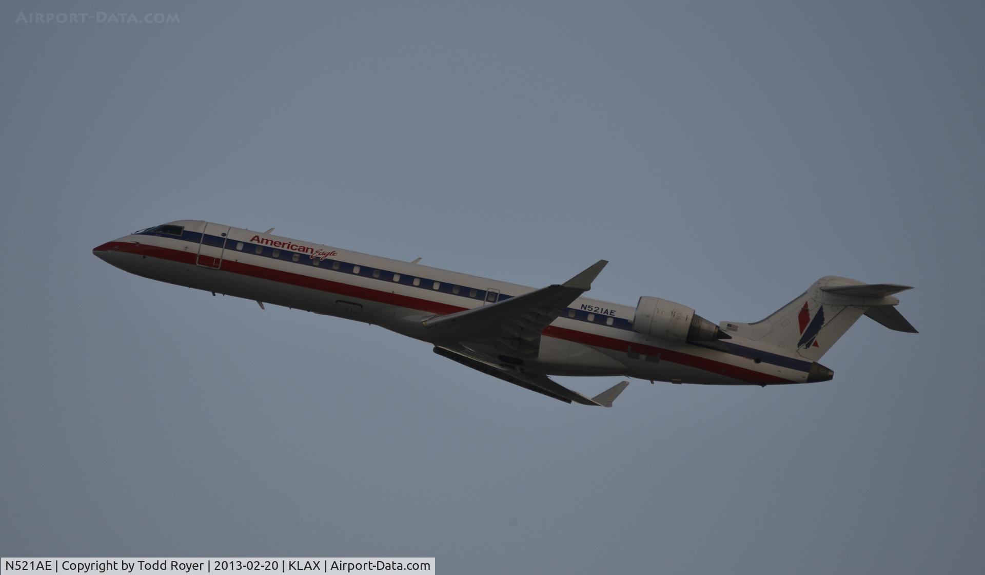 N521AE, 2004 Bombardier CRJ-701 (CL-600-2C10) Regional Jet C/N 10142, Departing LAX