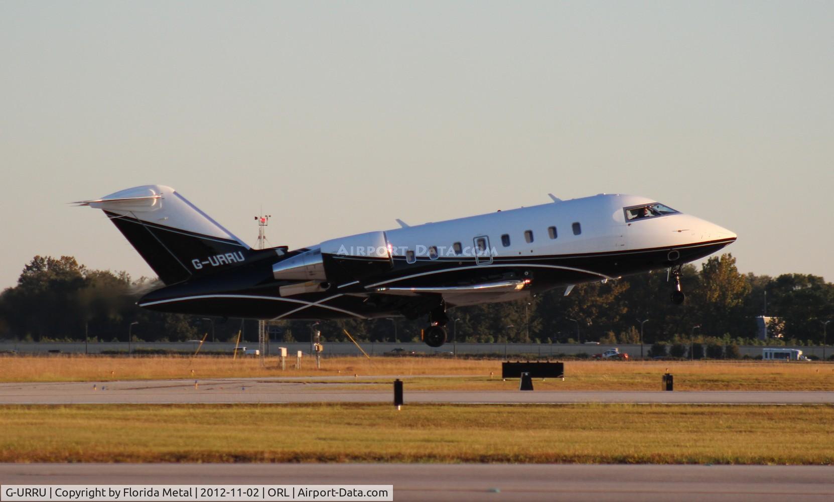 G-URRU, 2009 Bombardier Challenger 605 (CL-600-2B16) C/N 5821, Challenger 605 leaving NBAA