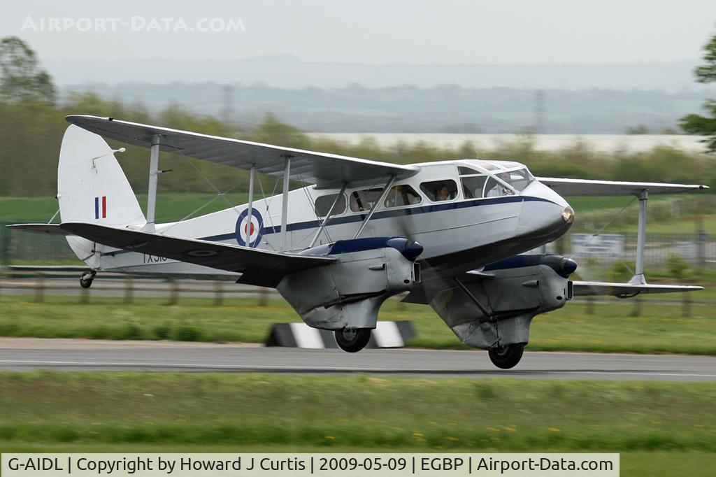 G-AIDL, 1946 De Havilland DH-89A Dominie/Dragon Rapide 6 C/N 6968, At the Great Vintage Flying Weekend. Painted as TX310.