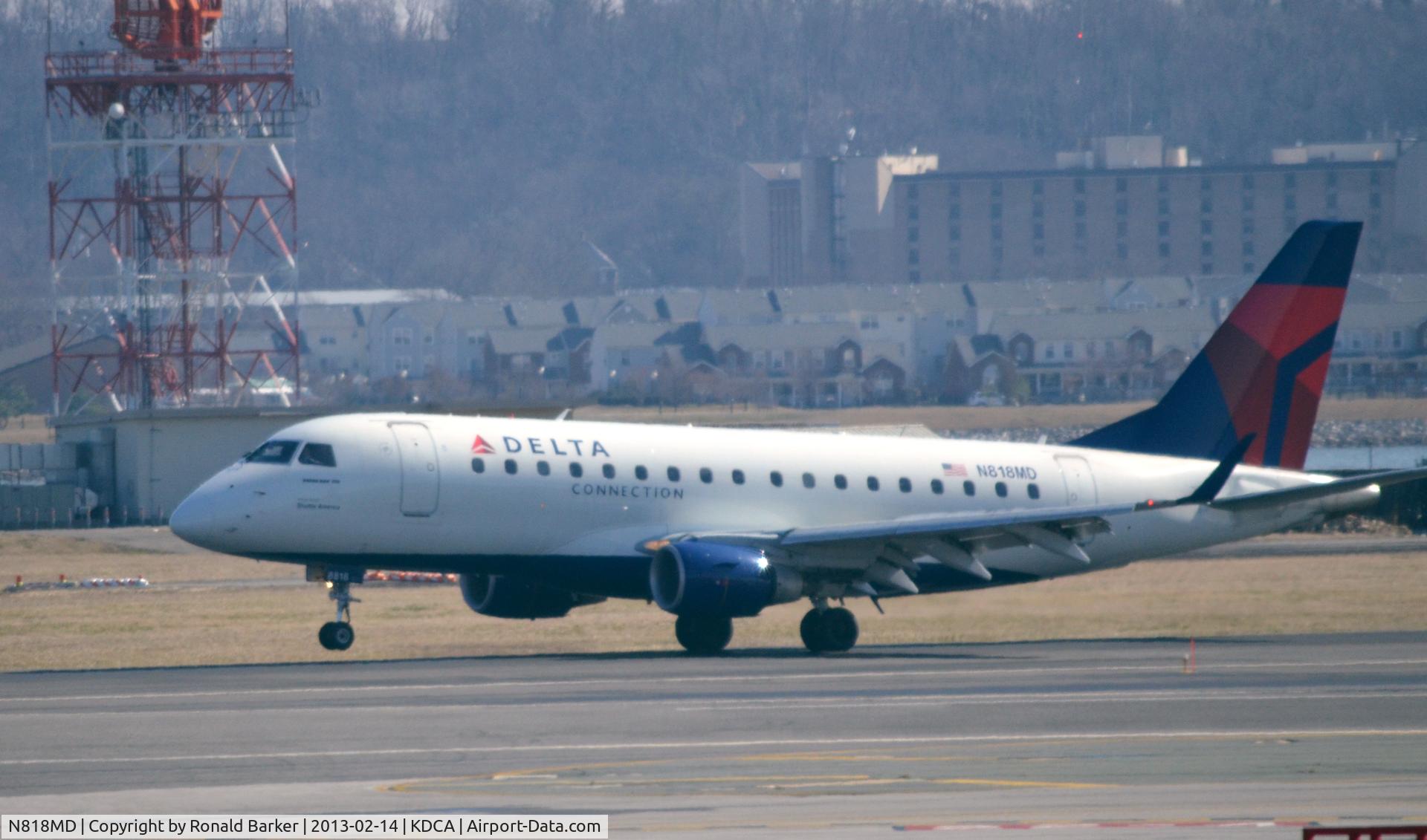 N818MD, 2004 Embraer 170SU (ERJ-170-100SU) C/N 17000039, Landing DCA