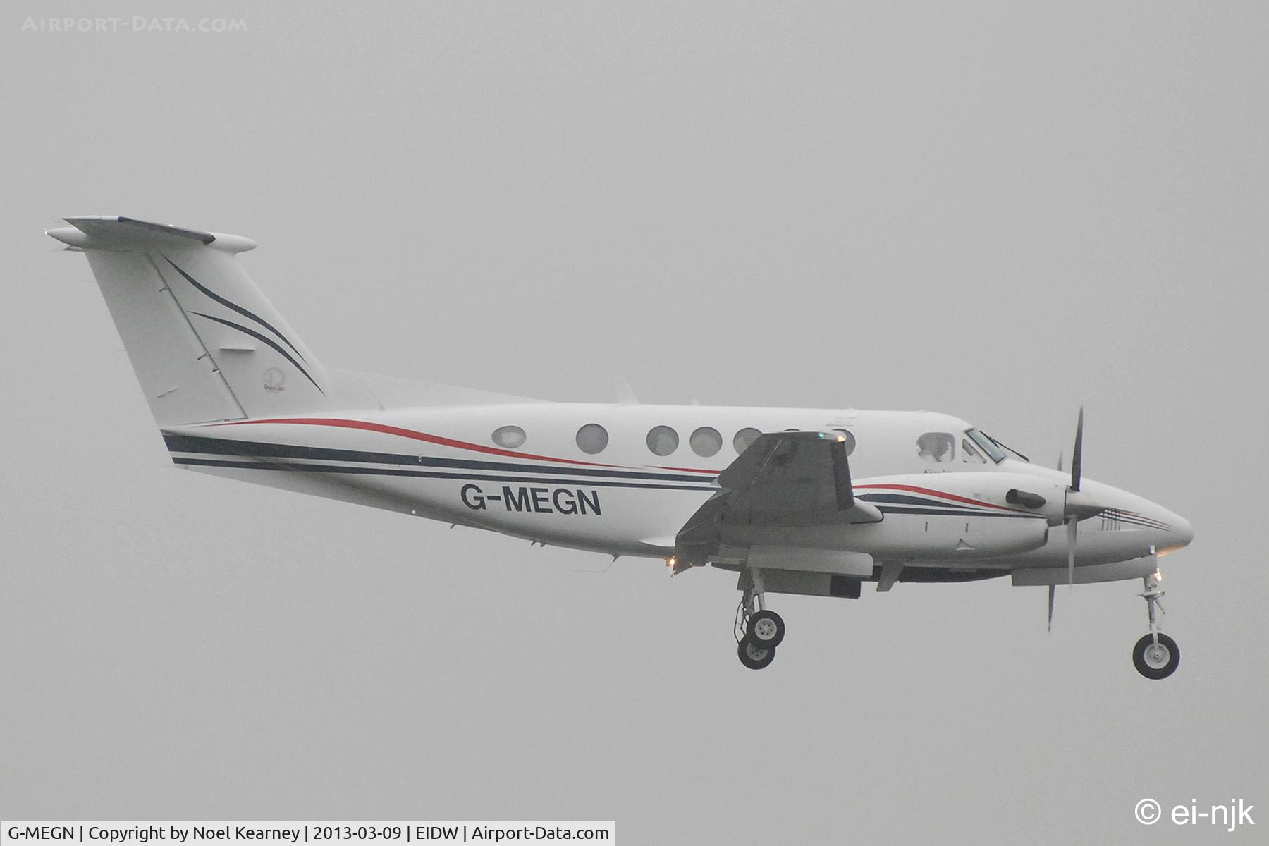G-MEGN, 1995 Beech B200 Super King Air King Air C/N BB-1518, Landing Rwy 10 at Dublin in the rain..
