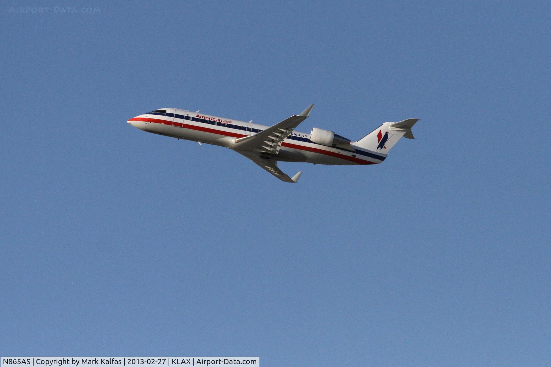 N865AS, 2001 Bombardier CRJ-200ER (CL-600-2B19) C/N 7507, Express Jet/American Eagle Bombardier CL-600-2B19,  SKW2267 departing 25R KLAX enroute to KABQ.