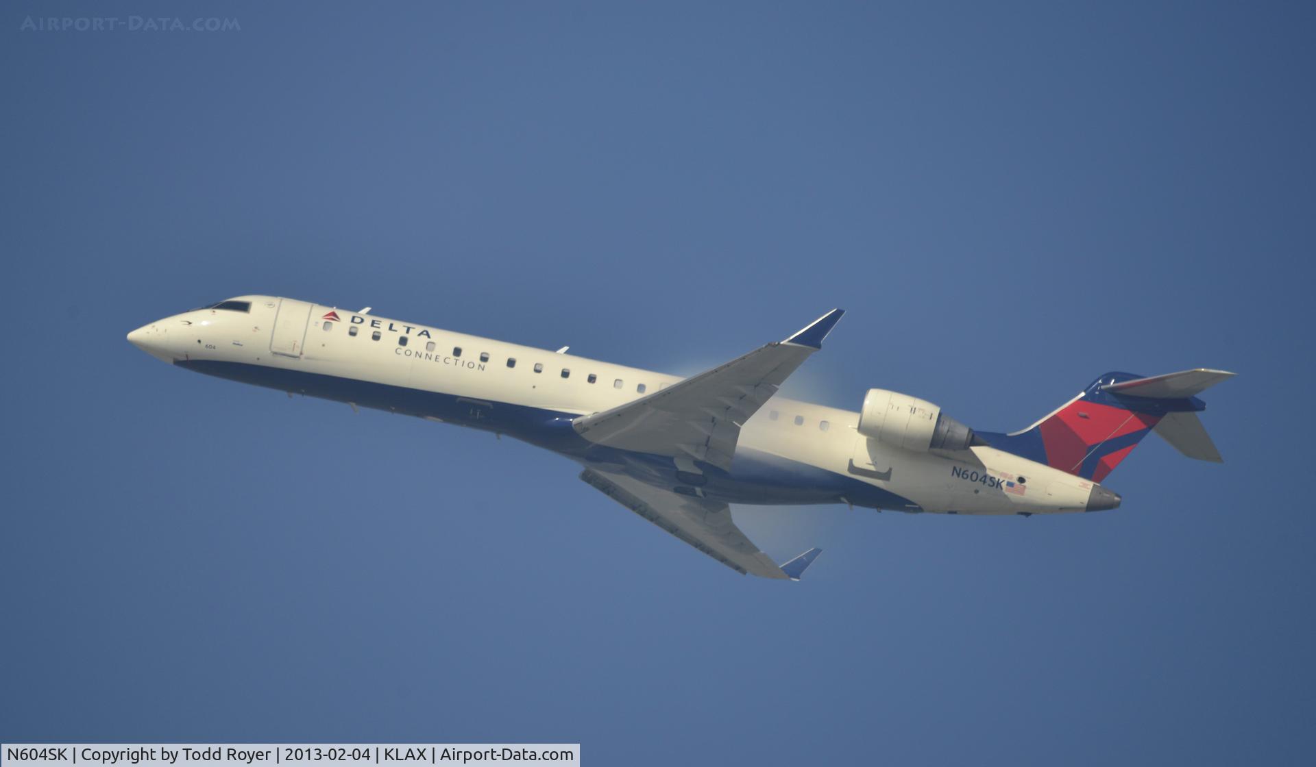 N604SK, 2006 Bombardier CRJ-702 (CL-600-2C10) Regional Jet C/N 10249, Departing LAX