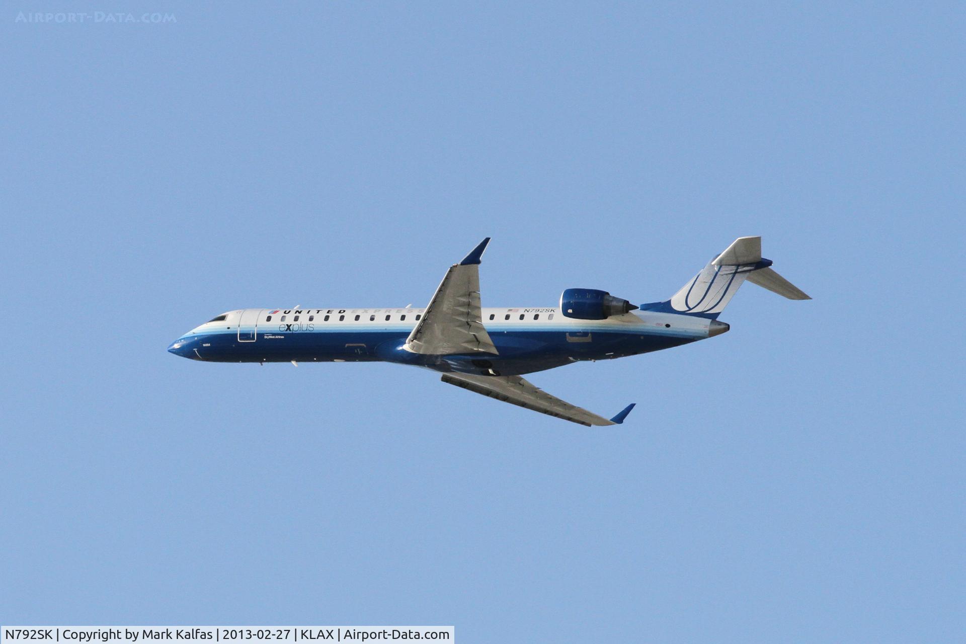 N792SK, 2009 Bombardier CRJ-700 (CL-600-2C10) Regional Jet C/N 10294, SkyWest/United Express Bombardier CL-600-2C10, SKW6528 departing on RWY 25R KLAX on a flight to Phoenix-KPHX.