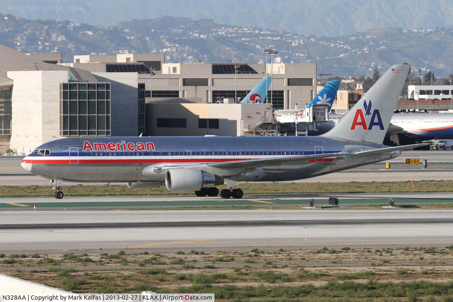 N328AA, 1986 Boeing 767-223 C/N 22328, American Airlines Boeing 767-223, AAL117 arriving from KJFK on TWY H at KLAX.