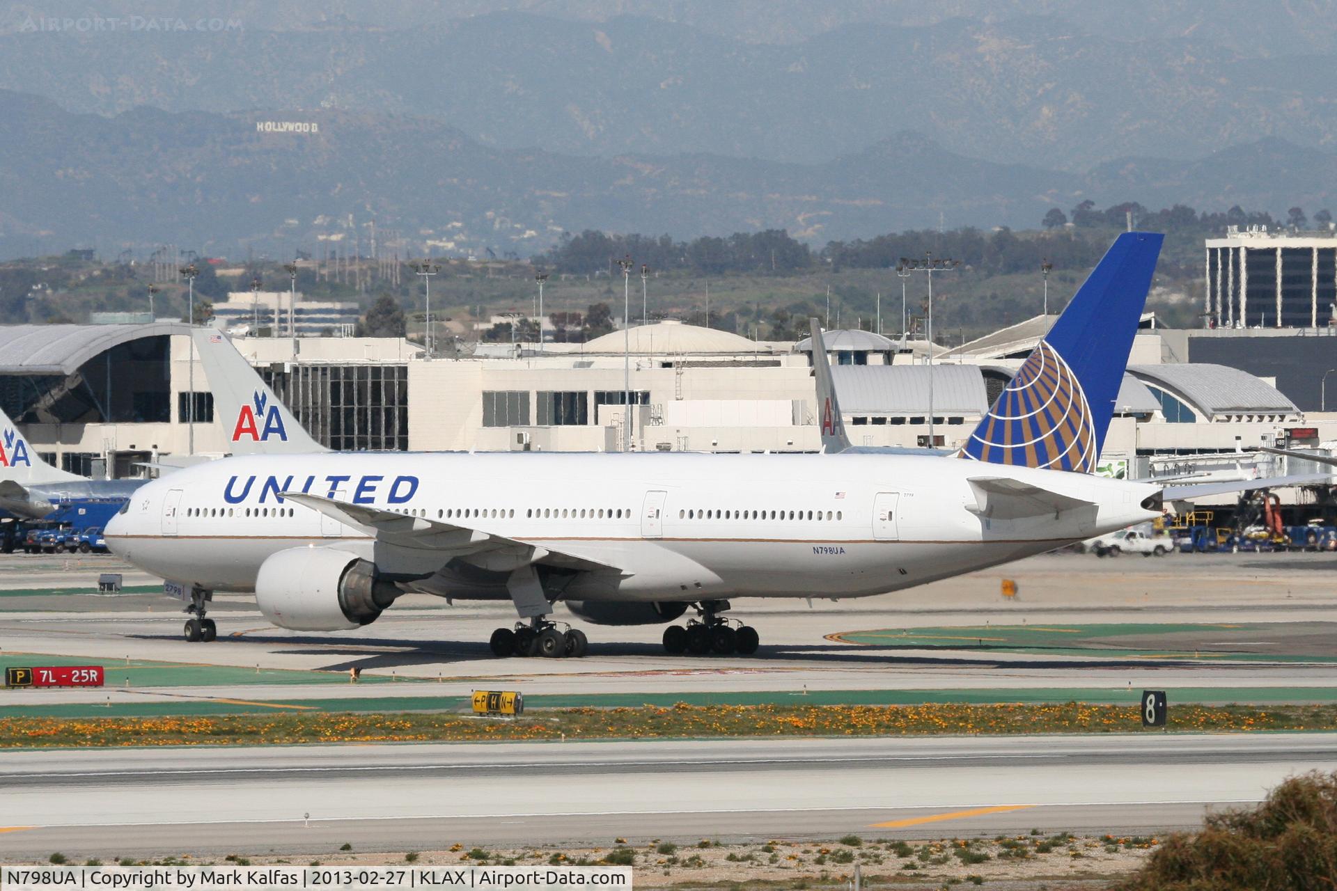 N798UA, 1998 Boeing 777-222ER C/N 26928, United Airlines Boeing 777-222,  UAL935 arriving from London- EGLL, off of 25R on TWY P KLAX.