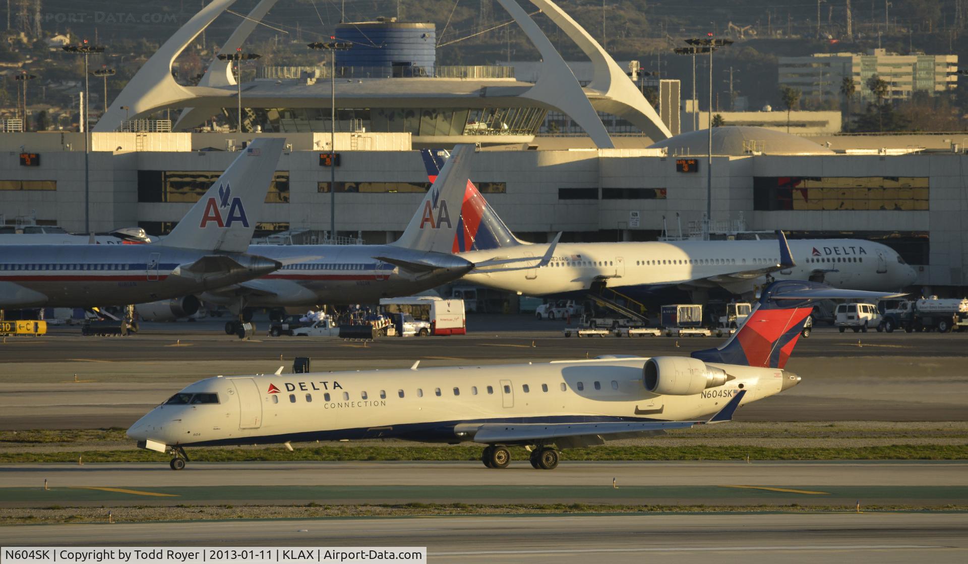 N604SK, 2006 Bombardier CRJ-702 (CL-600-2C10) Regional Jet C/N 10249, Taxiing to gate at LAX