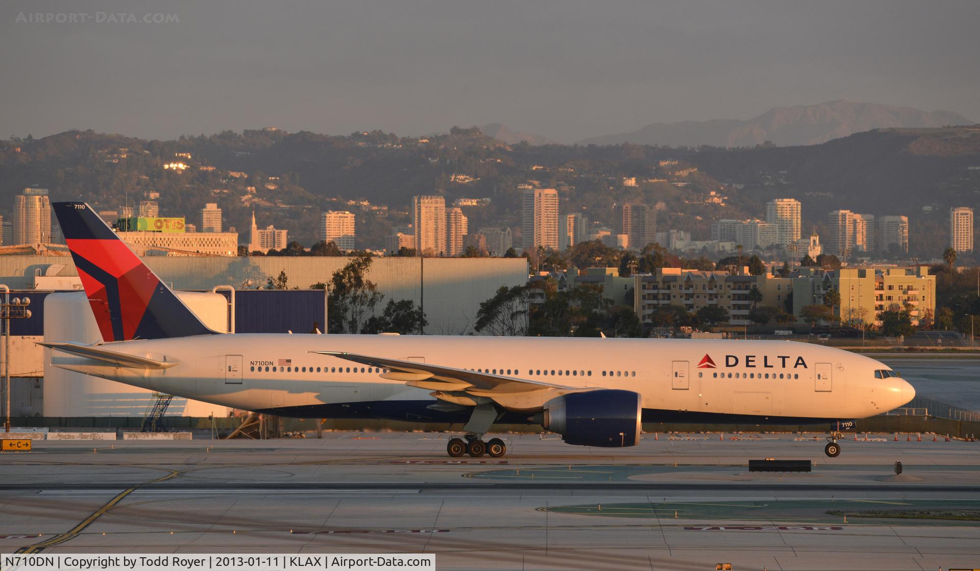 N710DN, 2010 Boeing 777-232/LR C/N 40560, Taxiing to gate at LAX