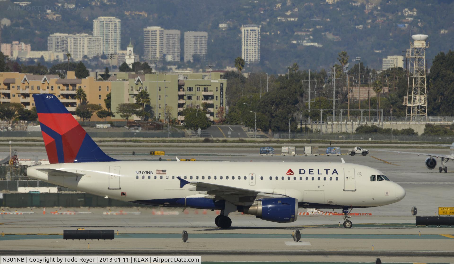 N301NB, 1999 Airbus A319-114 C/N 1058, Taxiing to gate