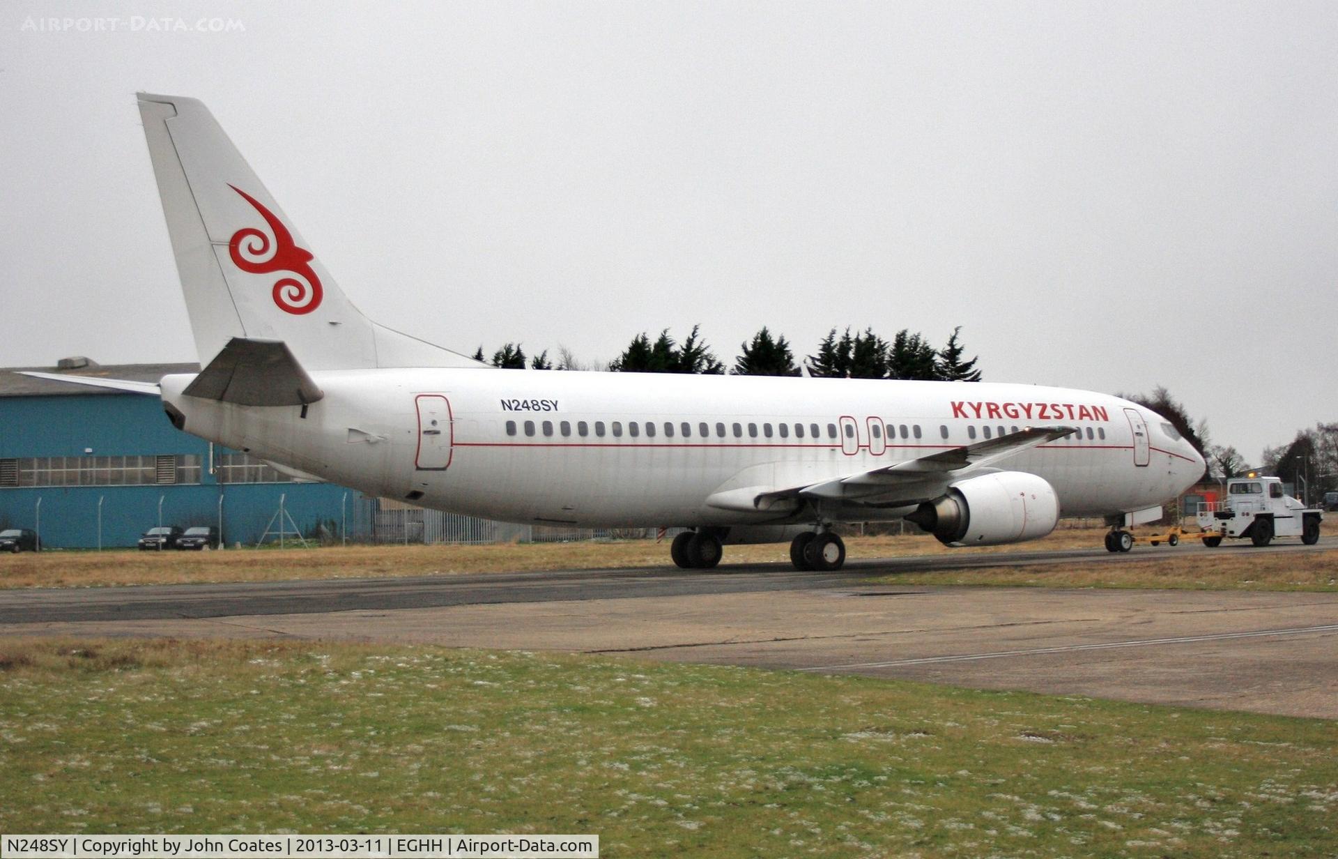 N248SY, 1991 Boeing 737-476 C/N 24438, Being towed onto apron at Airbourne Colours.