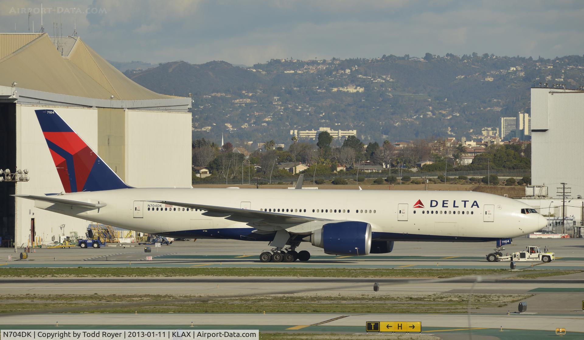 N704DK, 2009 Boeing 777-232/LR C/N 29739, Taxiing to gate at LAX