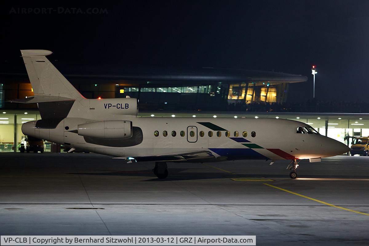 VP-CLB, 1998 Dassault Falcon 900EX C/N 34, Taxing on GRZ Airport at night.