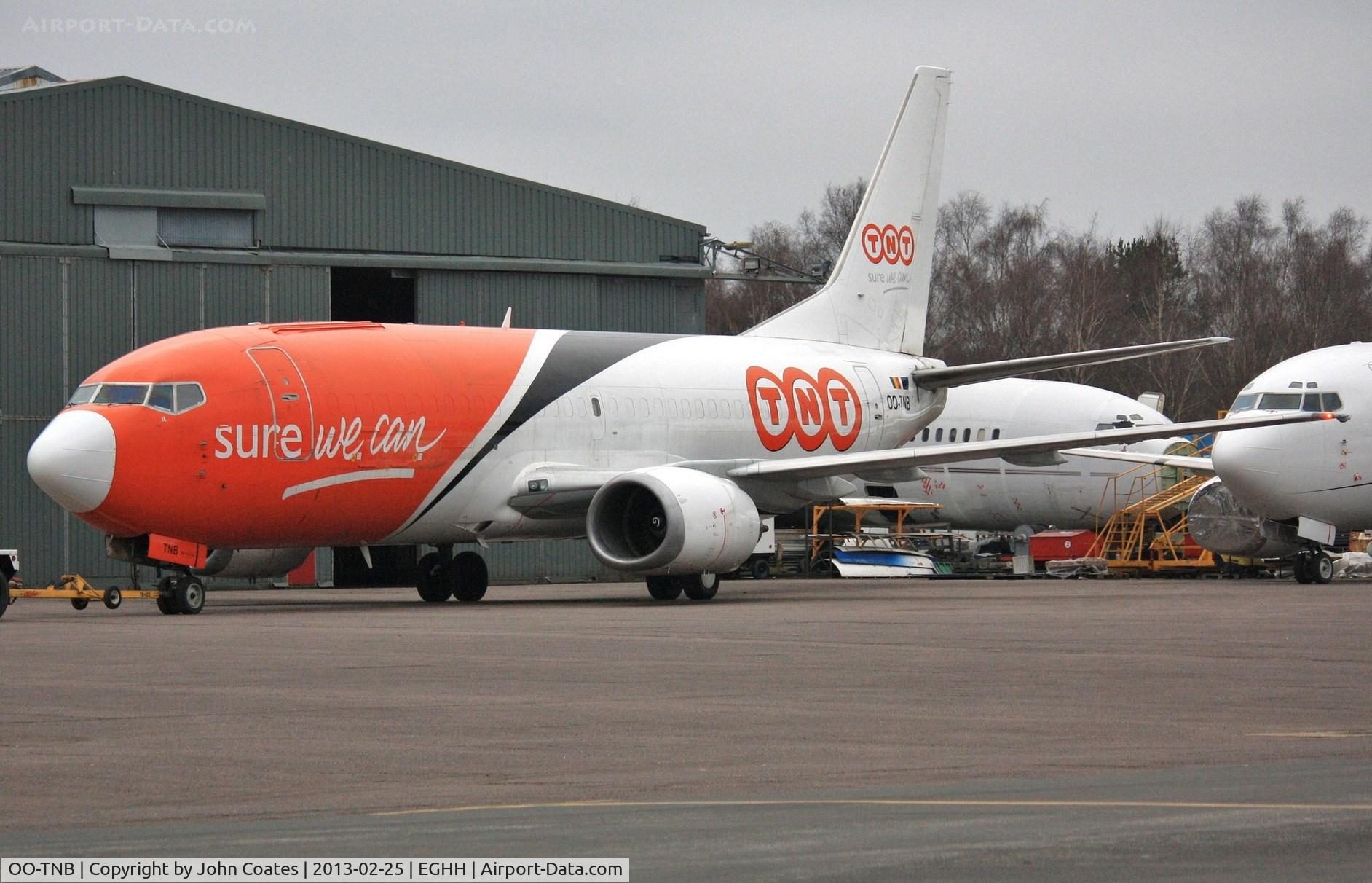 OO-TNB, 1987 Boeing 737-3T0F C/N 23578, Exits hangar after service