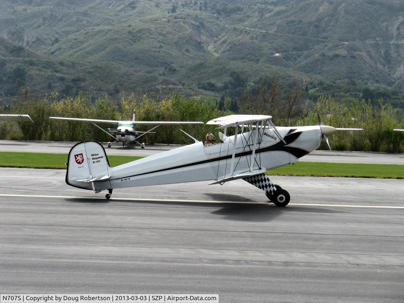 N707S, 1947 Bucker Bu-131 Jungmann C/N 211, 1947 Slovak Aero Praha G-104 Bucker Jungmann rebuild, Lycoming IO-360 A&C 200 Hp upgrade, Autopilot, forward tandem cockpit faired over, landing roll Rwy 22