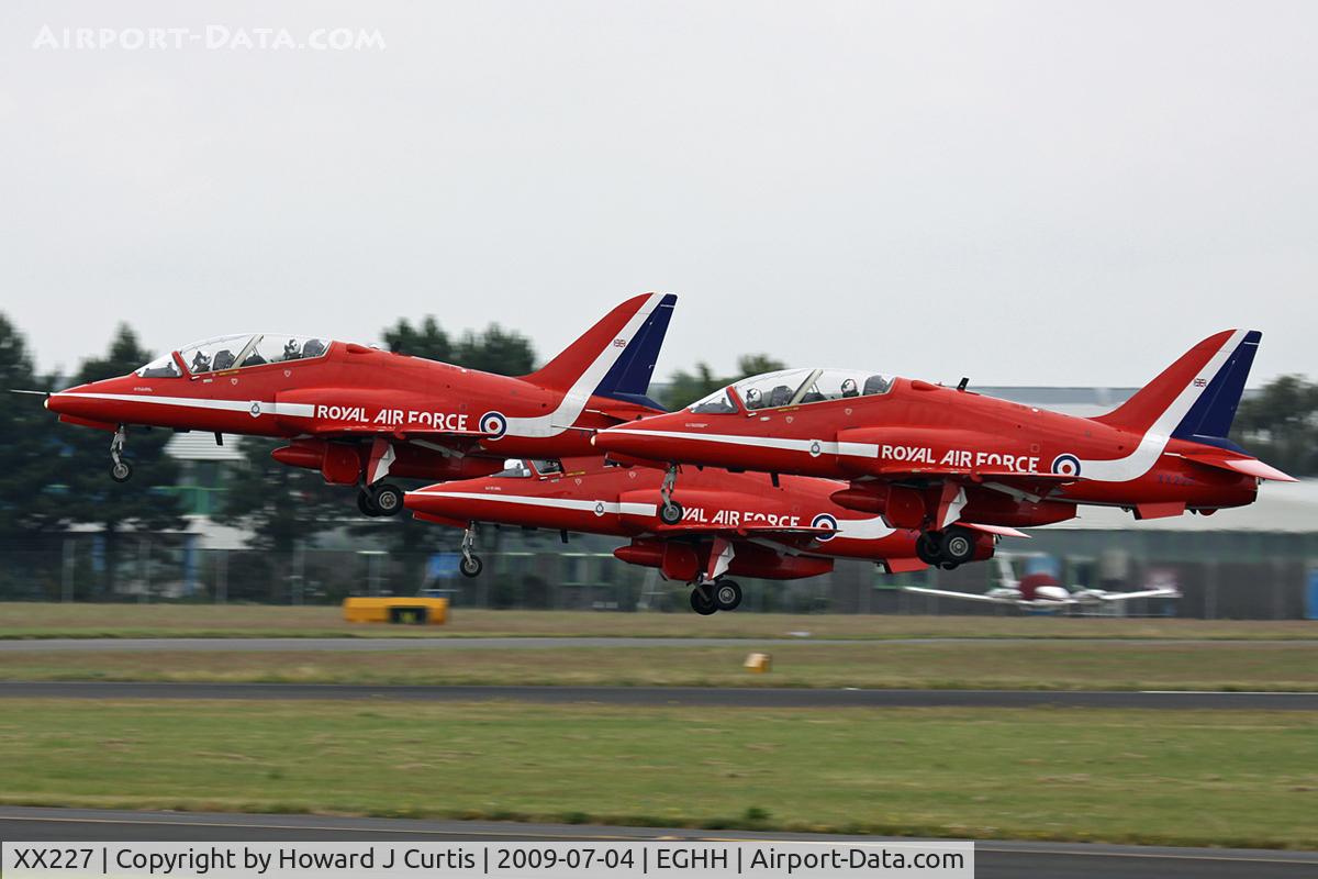 XX227, 1978 Hawker Siddeley Hawk T.1A C/N 063/312063, Three of the Red Arrows' Hawks, caught on departure.