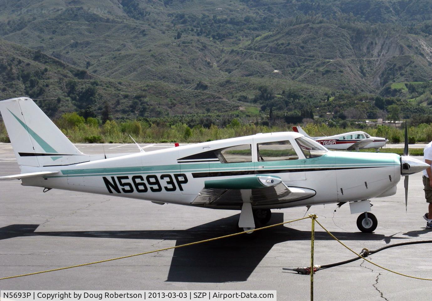 N5693P, 1959 Piper PA-24-250 Comanche C/N 24-766, 1959 Piper PA-24-250 COMANCHE, Lycoming O-540-A1A5 250 Hp, refueling, note bonding wire fastened to exhaust pipe