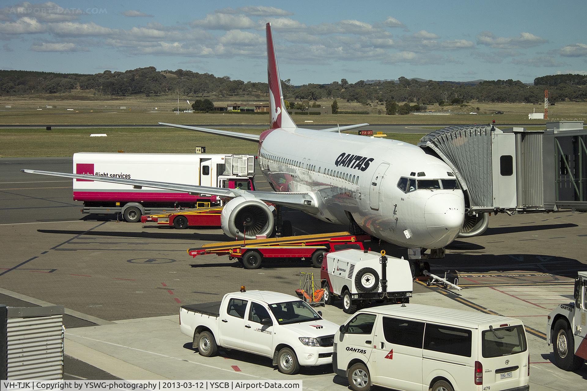 VH-TJK, 1990 Boeing 737-476 C/N 24436, Qantas (VH-TJK) Boeing 737-476 on the tarmac at Canberra Airport.