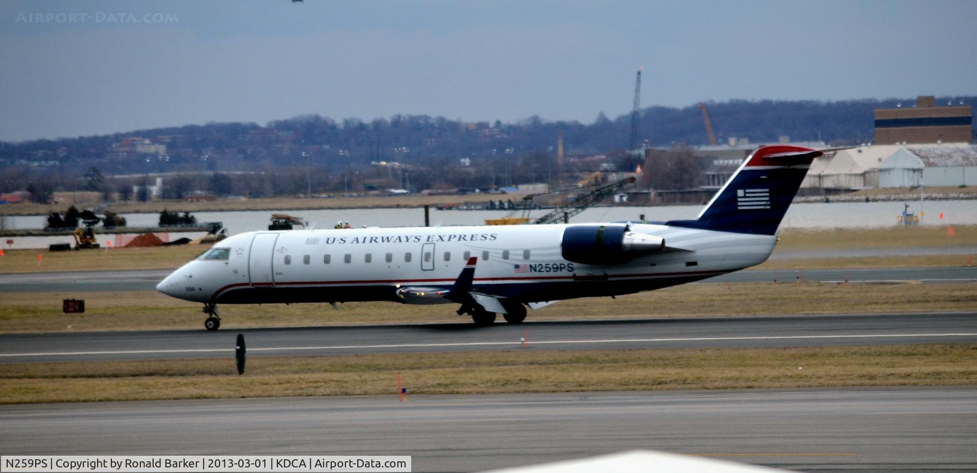 N259PS, 2004 Bombardier CRJ-200ER (CL-600-2B19) C/N 7945, Landing roll DCA
